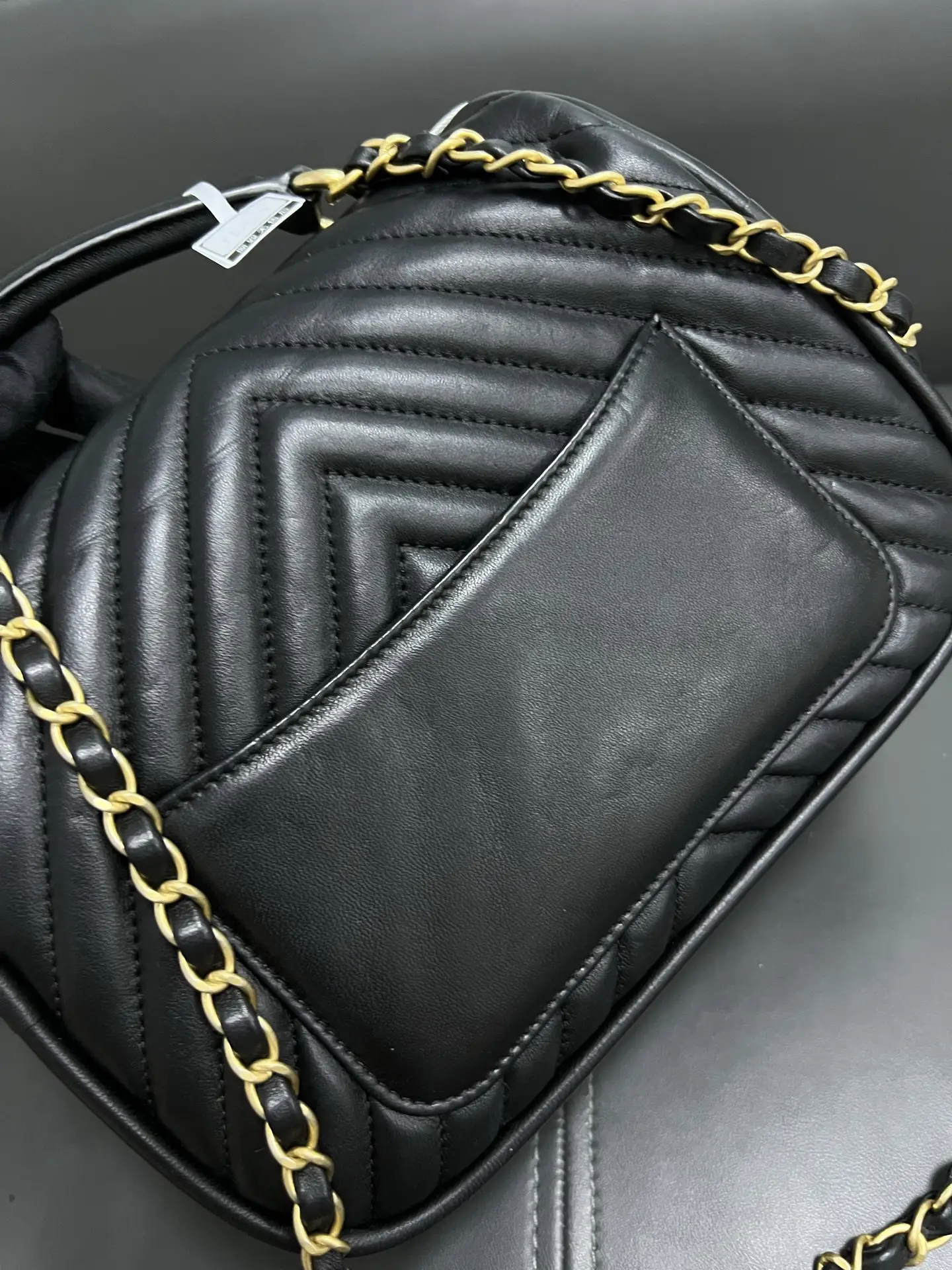 CHANEL Reversed Black Chevron Round Flap Bag CHANEL Reversed Black Chevron Round Flap Bag