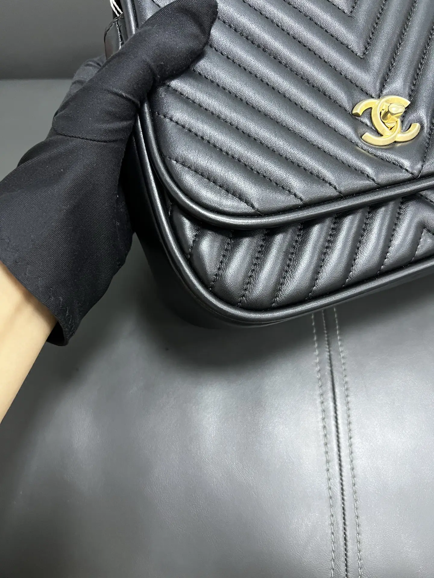 CHANEL Reversed Black Chevron Round Flap Bag CHANEL Reversed Black Chevron Round Flap Bag