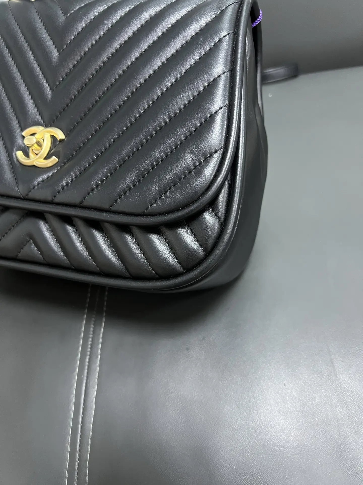 CHANEL Reversed Black Chevron Round Flap Bag CHANEL Reversed Black Chevron Round Flap Bag