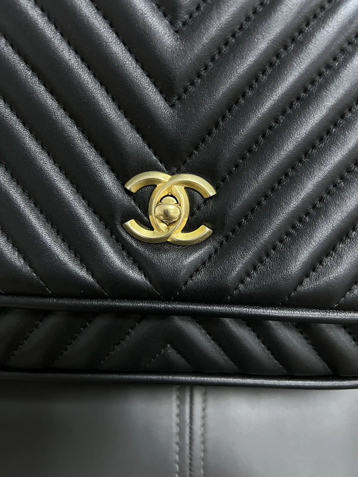 CHANEL Reversed Black Chevron Round Flap Bag CHANEL Reversed Black Chevron Round Flap Bag