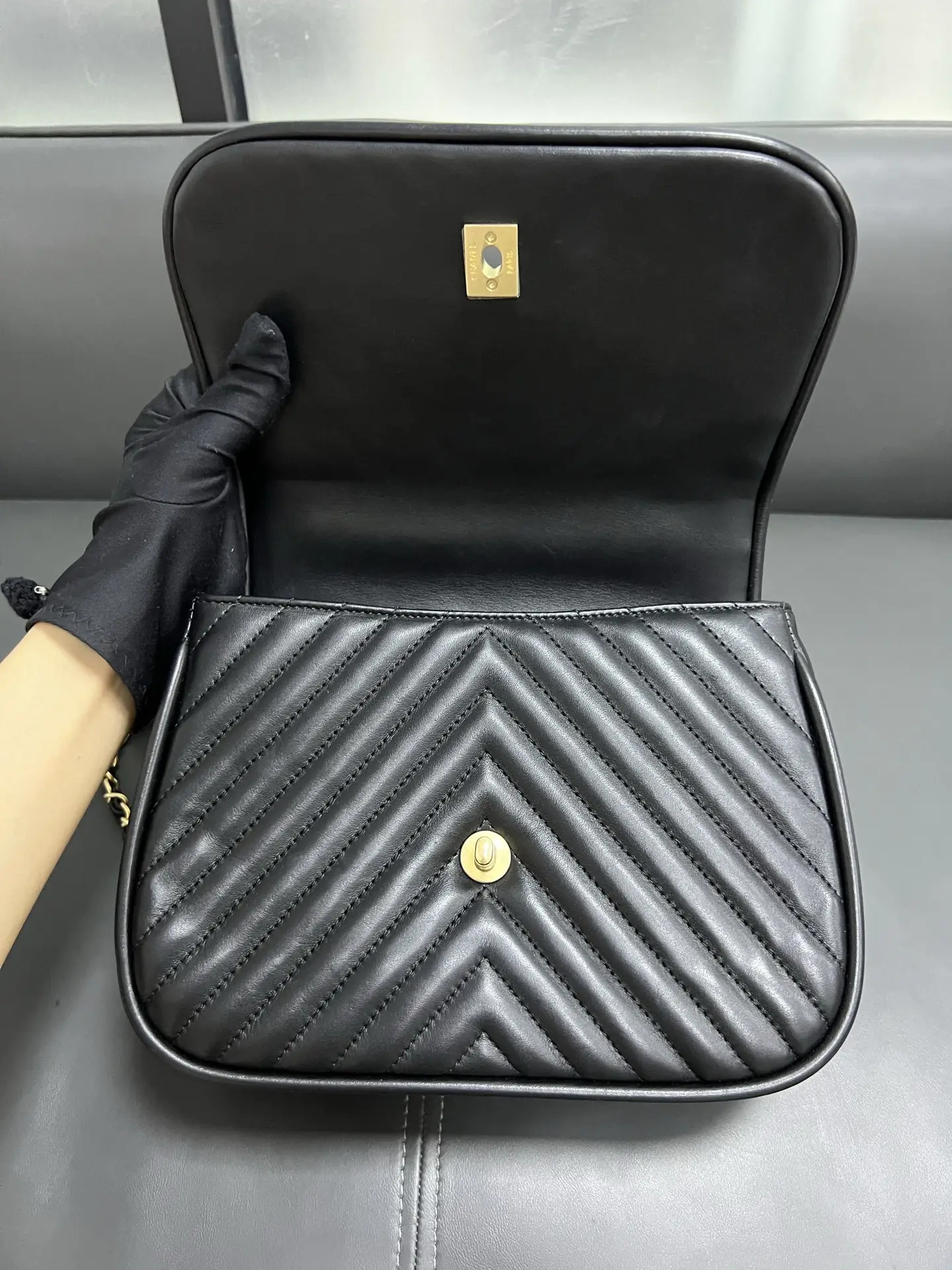 CHANEL Reversed Black Chevron Round Flap Bag CHANEL Reversed Black Chevron Round Flap Bag