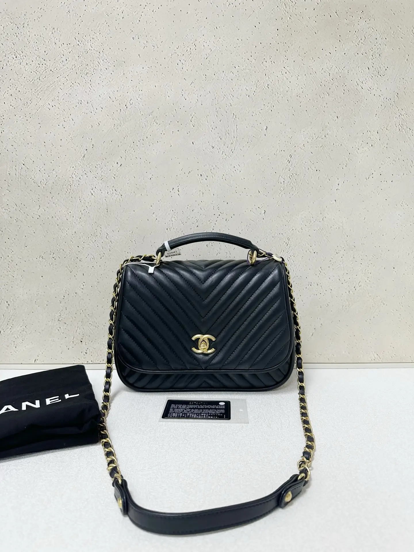 CHANEL Reversed Black Chevron Round Flap Bag CHANEL Reversed Black Chevron Round Flap Bag