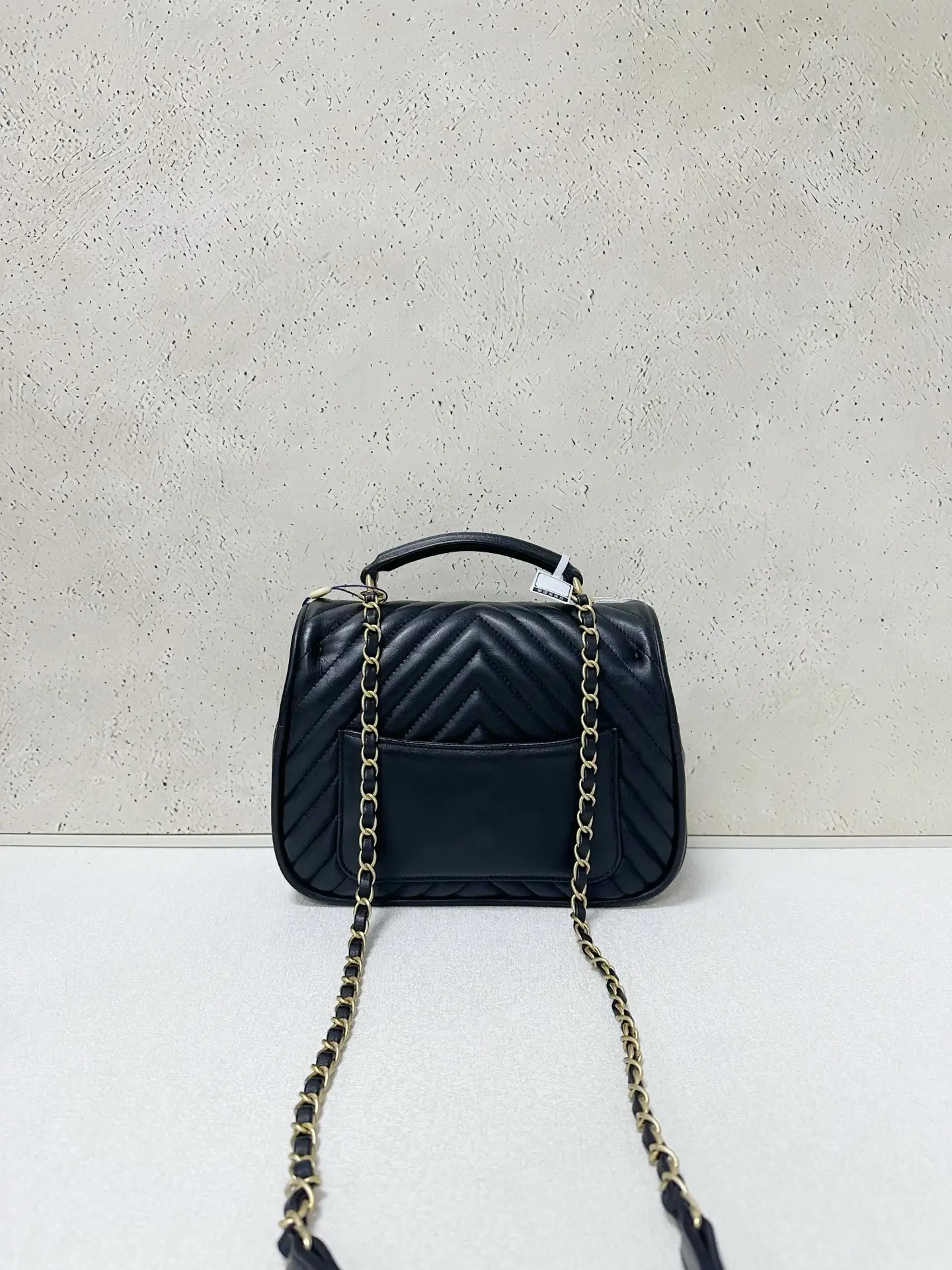 CHANEL Reversed Black Chevron Round Flap Bag CHANEL Reversed Black Chevron Round Flap Bag