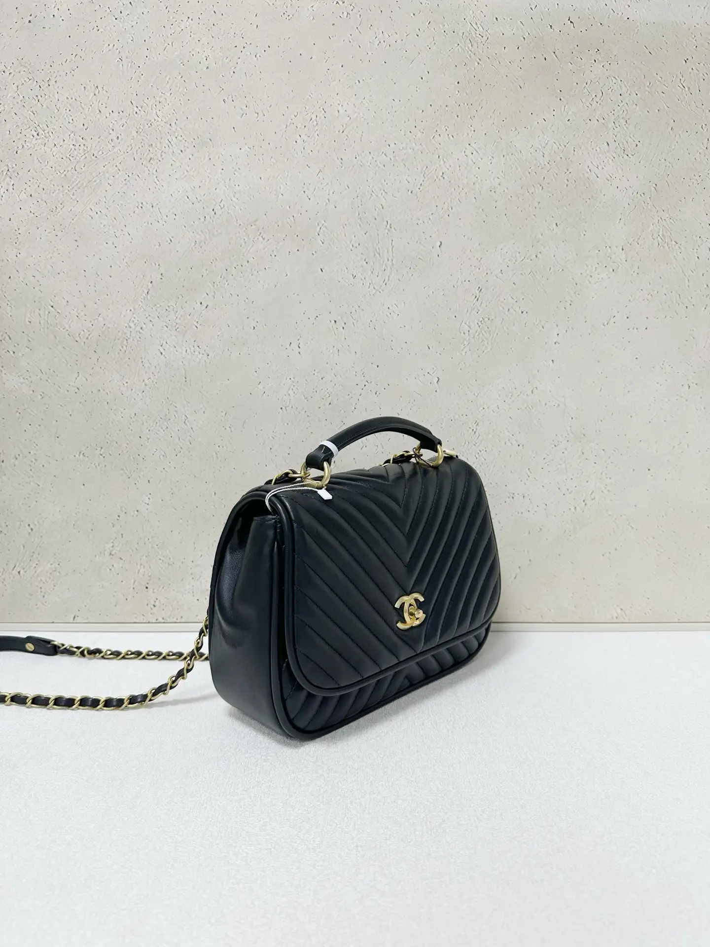CHANEL Reversed Black Chevron Round Flap Bag CHANEL Reversed Black Chevron Round Flap Bag