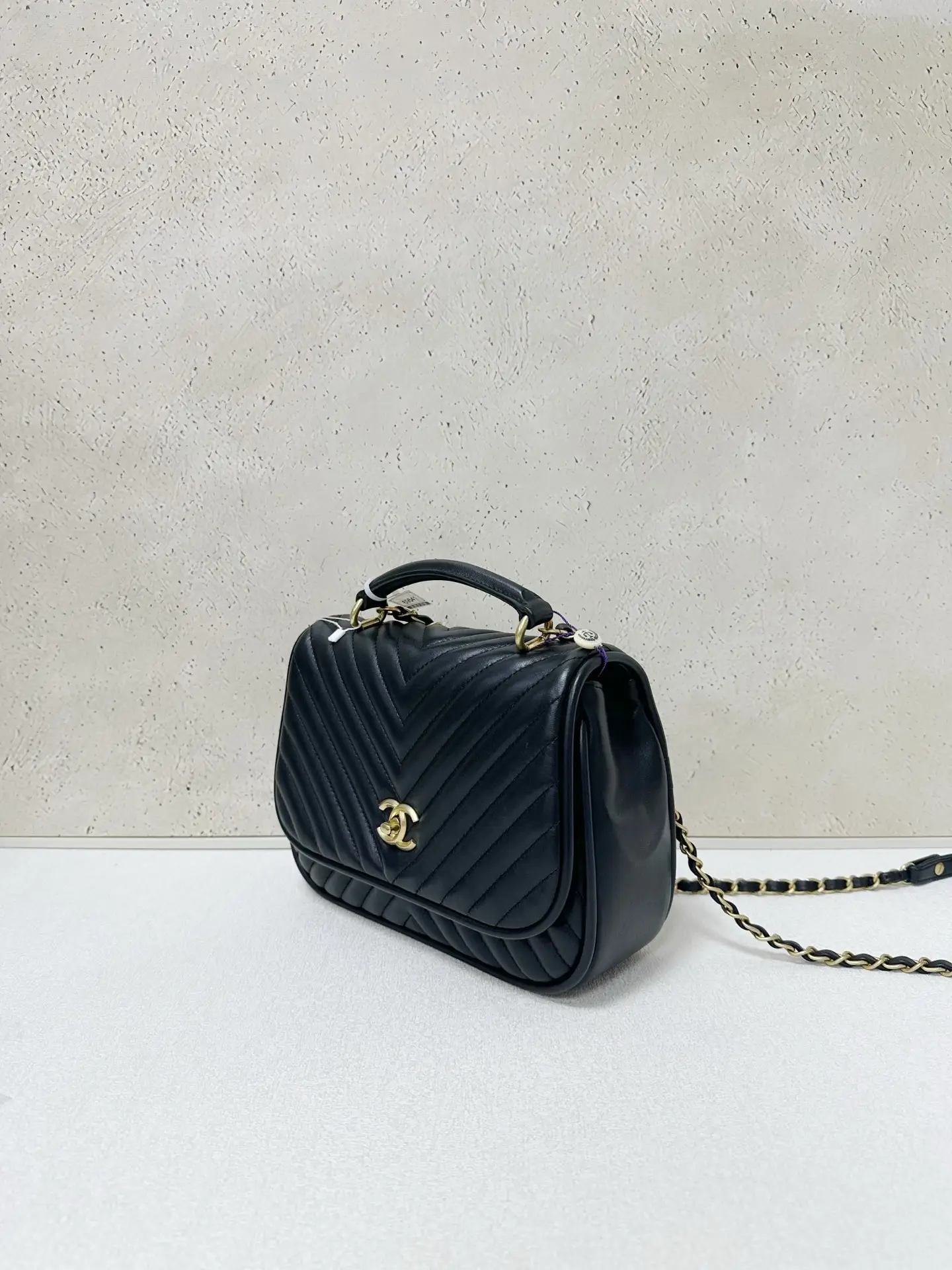CHANEL Reversed Black Chevron Round Flap Bag CHANEL Reversed Black Chevron Round Flap Bag