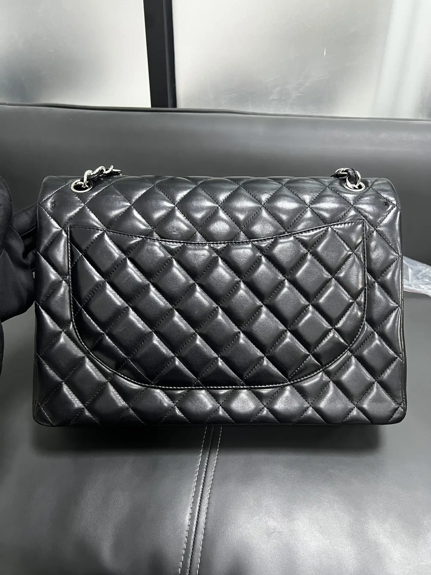 CHANEL Maxi Classic Flap Handbag Black Lambskin CHANEL Maxi Classic Flap Handbag Black Lambskin