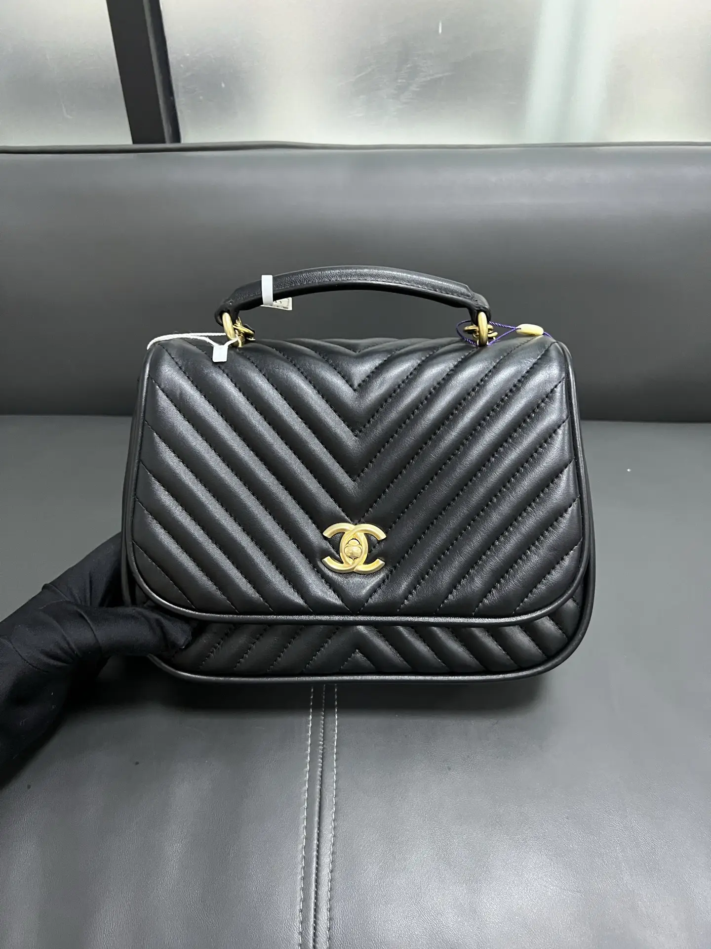 CHANEL Reversed Black Chevron Round Flap Bag CHANEL Reversed Black Chevron Round Flap Bag