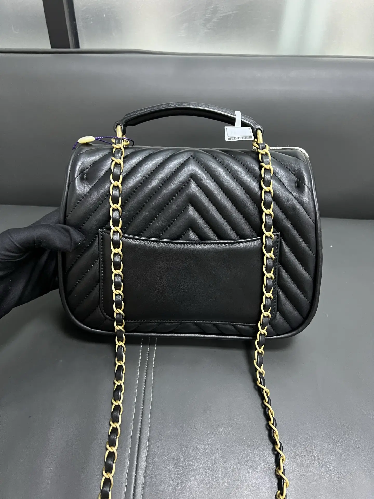 CHANEL Reversed Black Chevron Round Flap Bag CHANEL Reversed Black Chevron Round Flap Bag
