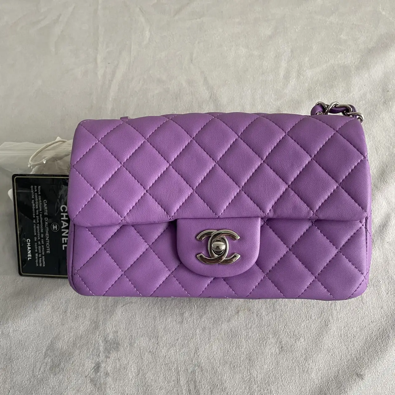 CHANEL Mini Classic Flap Bag in Purple Lambskin with Silver-Tone Hardware CHANEL Mini Classic Flap Bag in Purple Lambskin with Silver-Tone Hardware