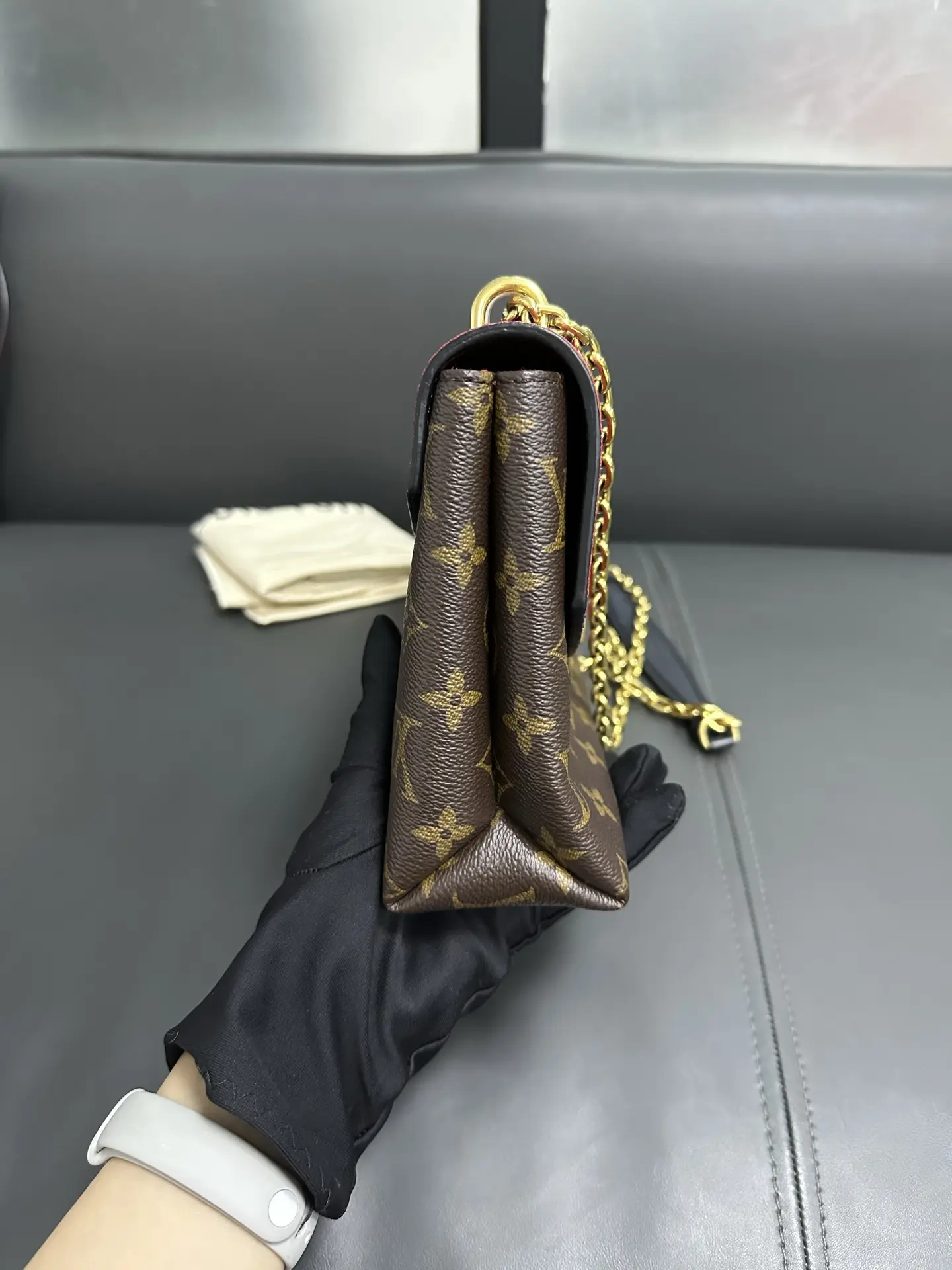 LOUIS VUITTON Saint Placide Envelope Bag in Red Monogram Empreinte Leather LOUIS VUITTON Saint Placide Envelope Bag in Red Monogram Empreinte Leather