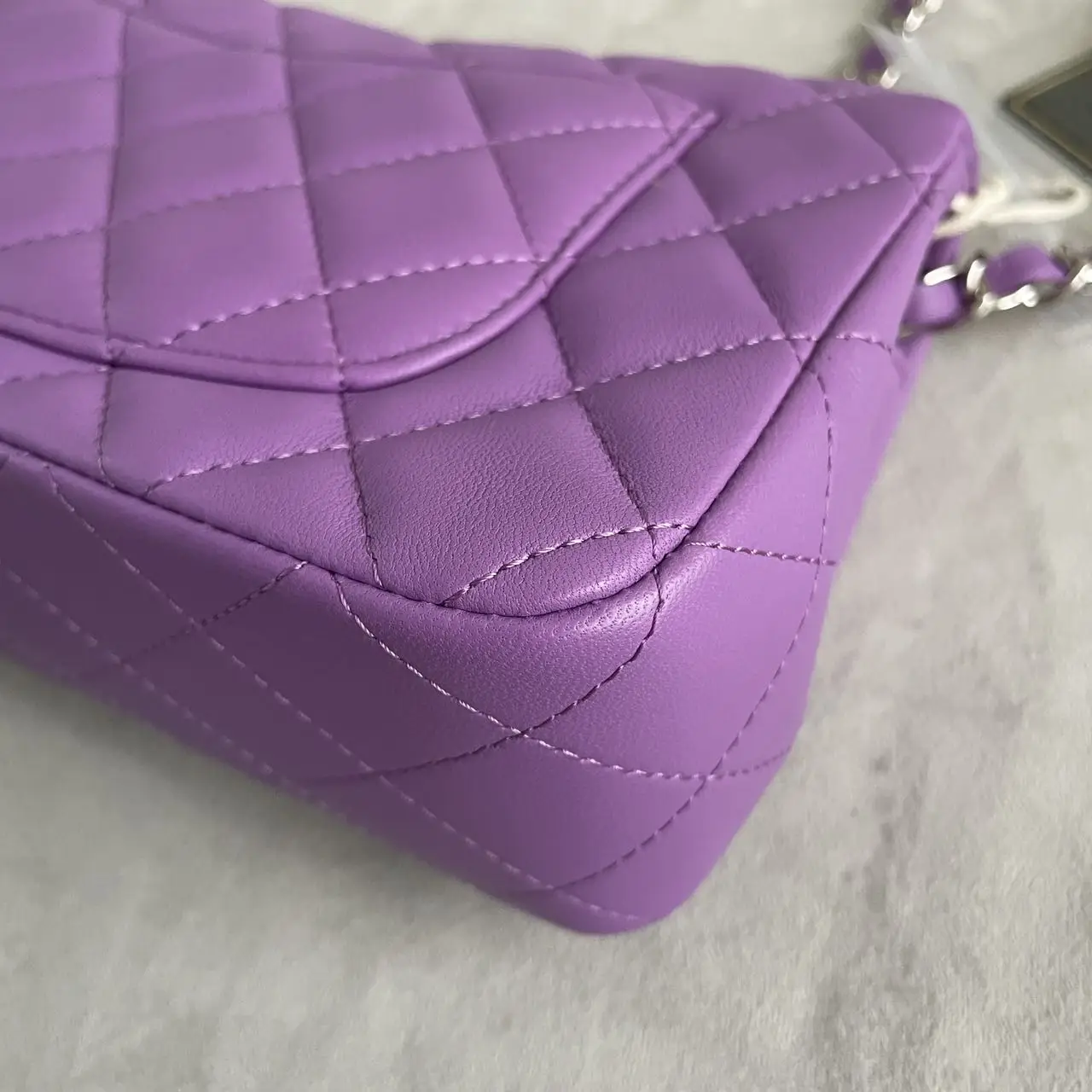 CHANEL Mini Classic Flap Bag in Purple Lambskin with Silver-Tone Hardware CHANEL Mini Classic Flap Bag in Purple Lambskin with Silver-Tone Hardware