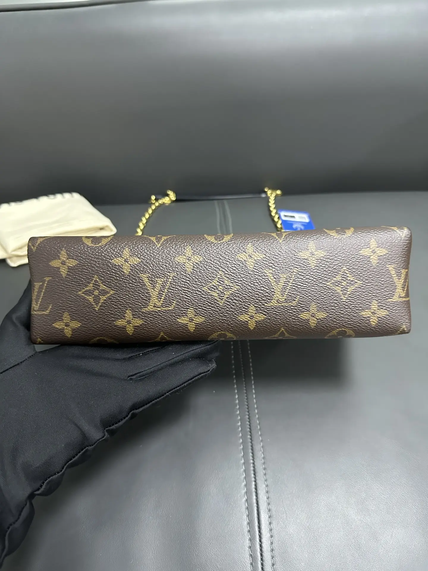 LOUIS VUITTON Saint Placide Envelope Bag in Red Monogram Empreinte Leather LOUIS VUITTON Saint Placide Envelope Bag in Red Monogram Empreinte Leather