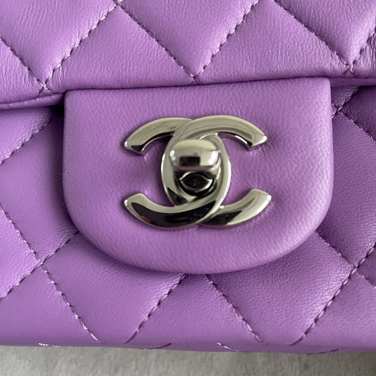 CHANEL Mini Classic Flap Bag in Purple Lambskin with Silver-Tone Hardware CHANEL Mini Classic Flap Bag in Purple Lambskin with Silver-Tone Hardware