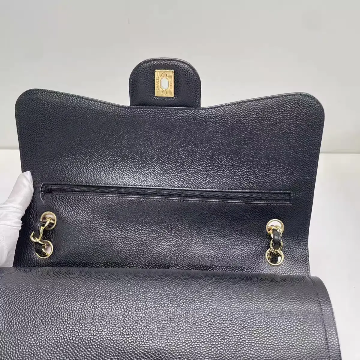 CHANEL Classic Flap Jumbo Handbag in Black Caviar Leather CHANEL Classic Flap Jumbo Handbag in Black Caviar Leather