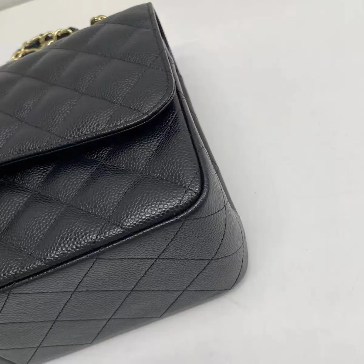 CHANEL Classic Flap Jumbo Handbag in Black Caviar Leather CHANEL Classic Flap Jumbo Handbag in Black Caviar Leather