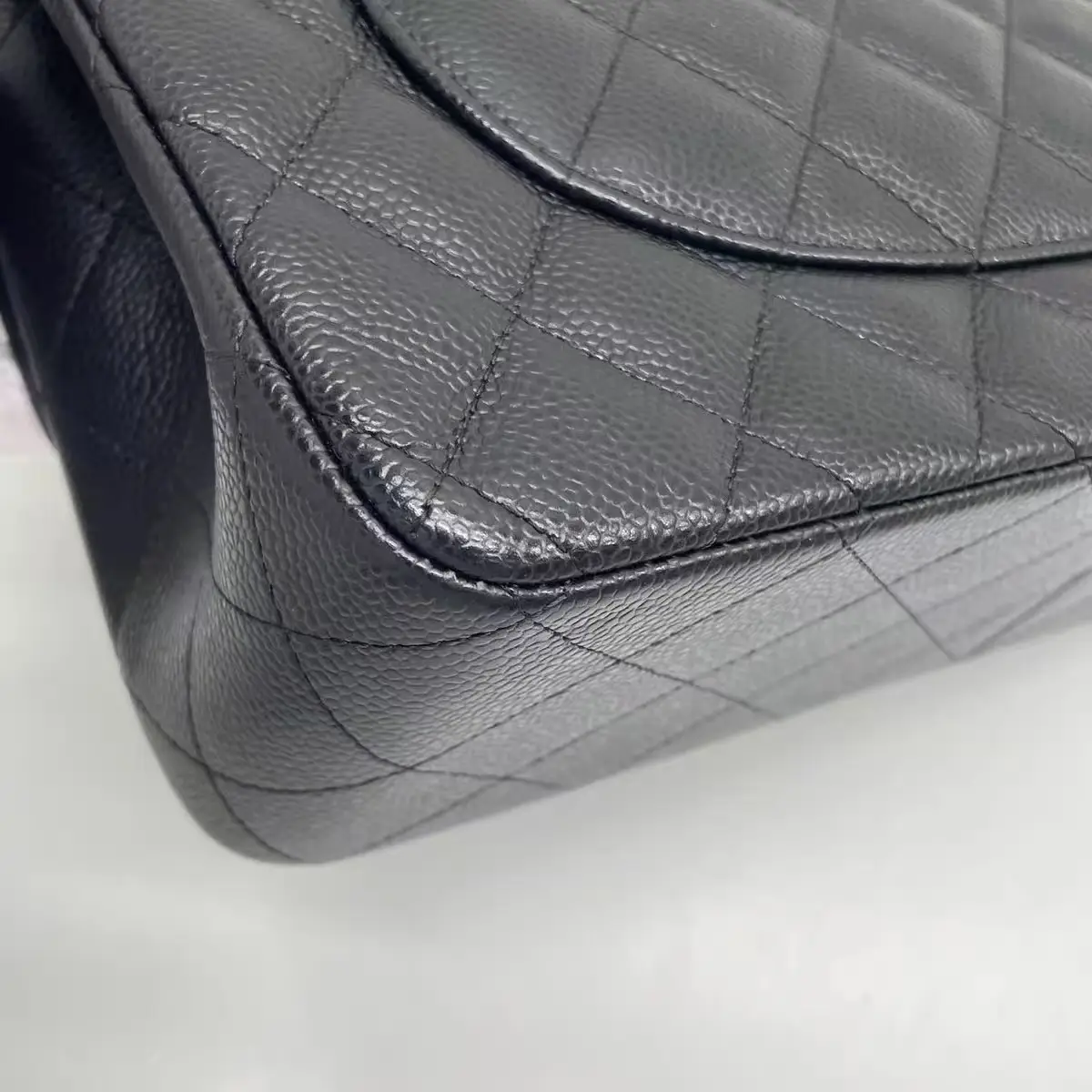 CHANEL Classic Flap Jumbo Handbag in Black Caviar Leather CHANEL Classic Flap Jumbo Handbag in Black Caviar Leather