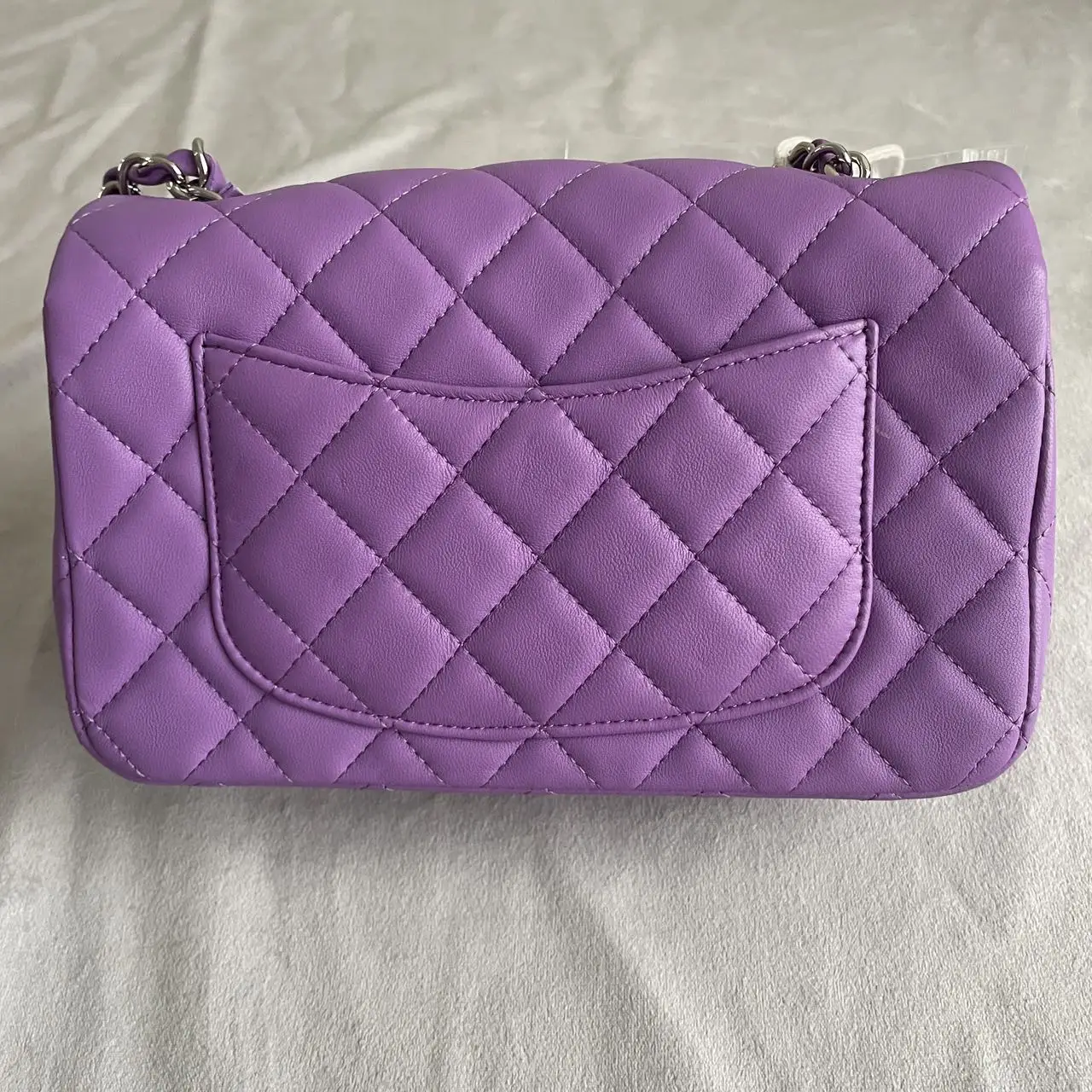 CHANEL Mini Classic Flap Bag in Purple Lambskin with Silver-Tone Hardware CHANEL Mini Classic Flap Bag in Purple Lambskin with Silver-Tone Hardware