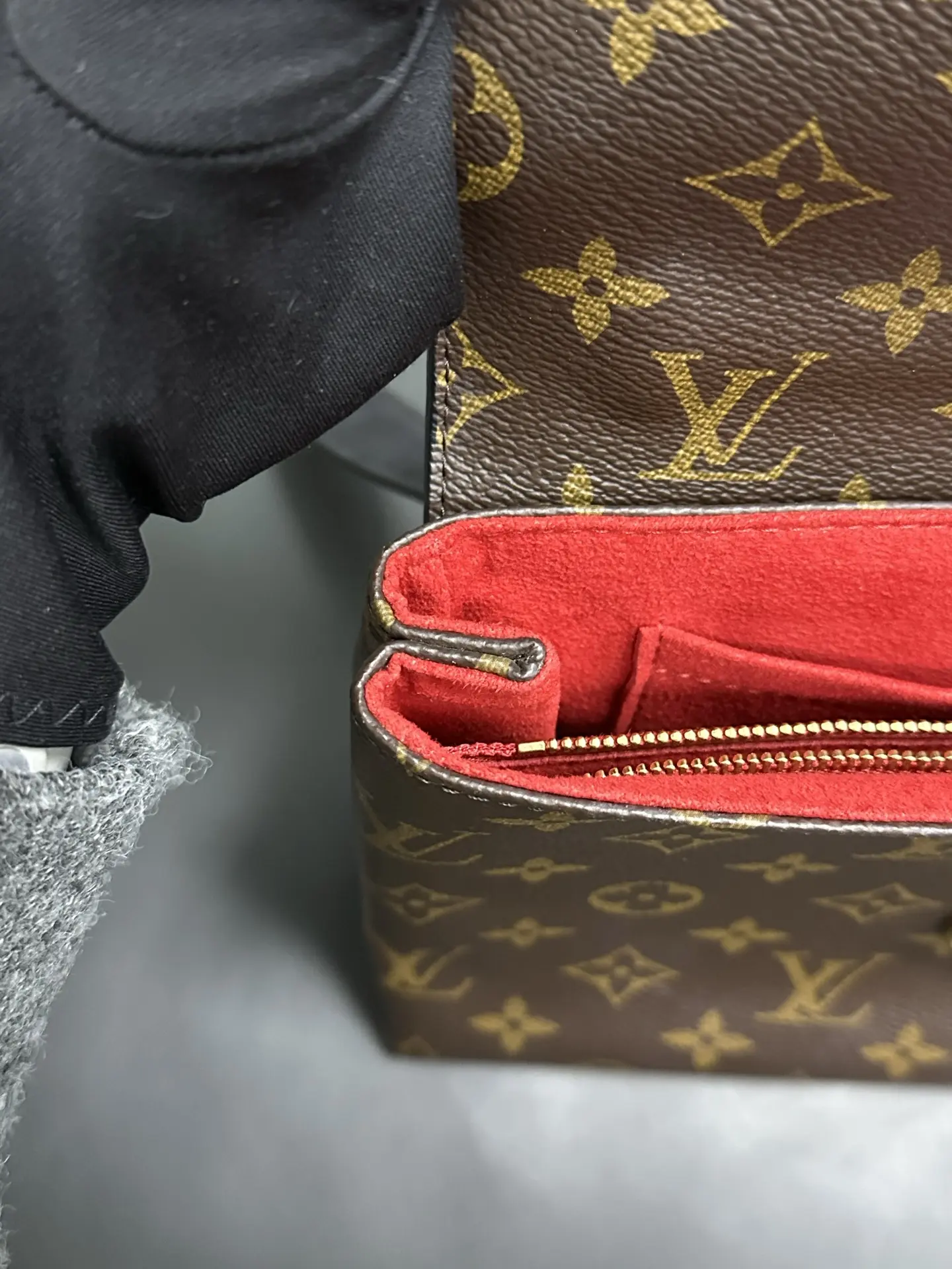 LOUIS VUITTON Saint Placide Envelope Bag in Red Monogram Empreinte Leather LOUIS VUITTON Saint Placide Envelope Bag in Red Monogram Empreinte Leather