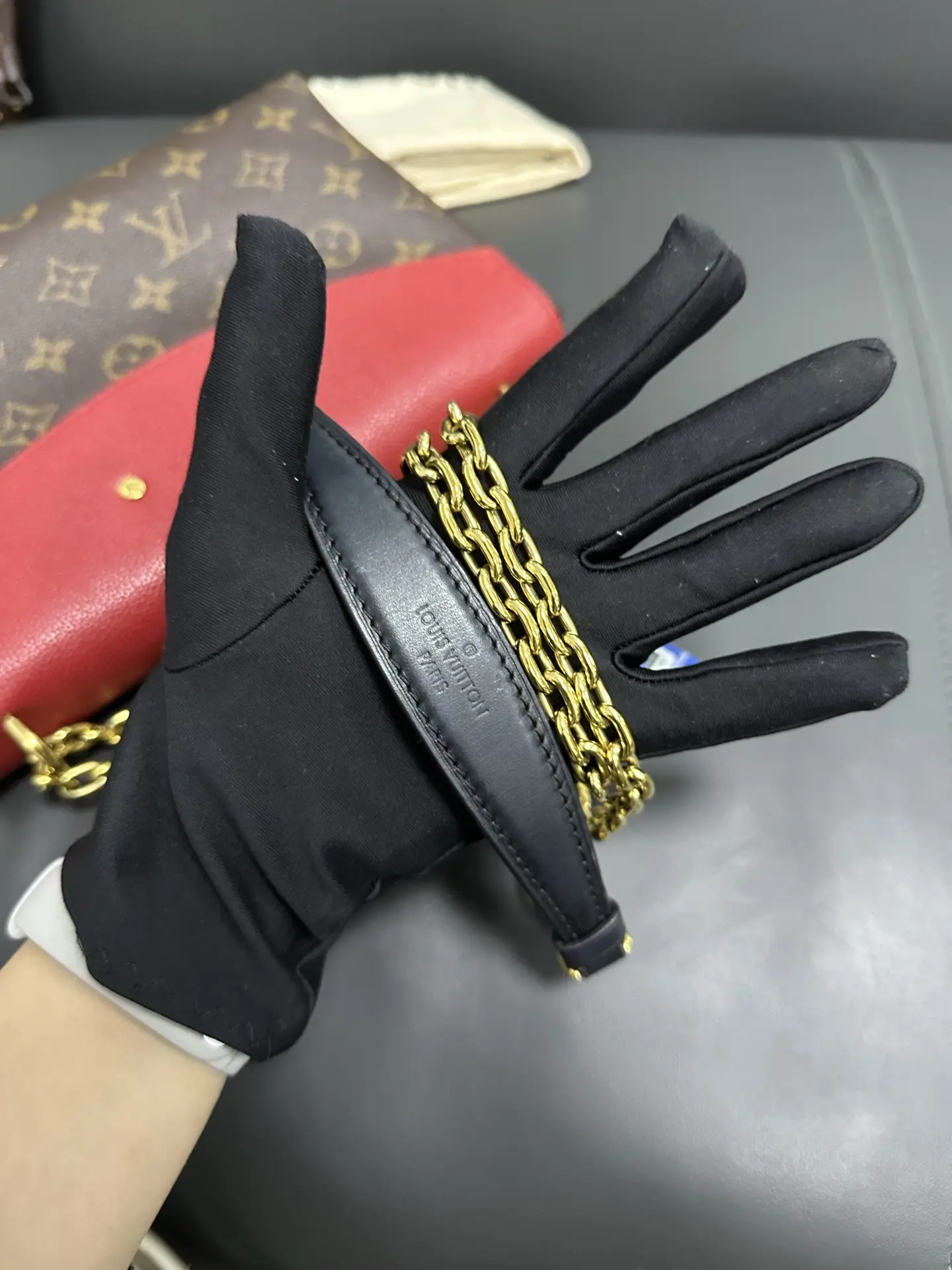 LOUIS VUITTON Saint Placide Envelope Bag in Red Monogram Empreinte Leather LOUIS VUITTON Saint Placide Envelope Bag in Red Monogram Empreinte Leather