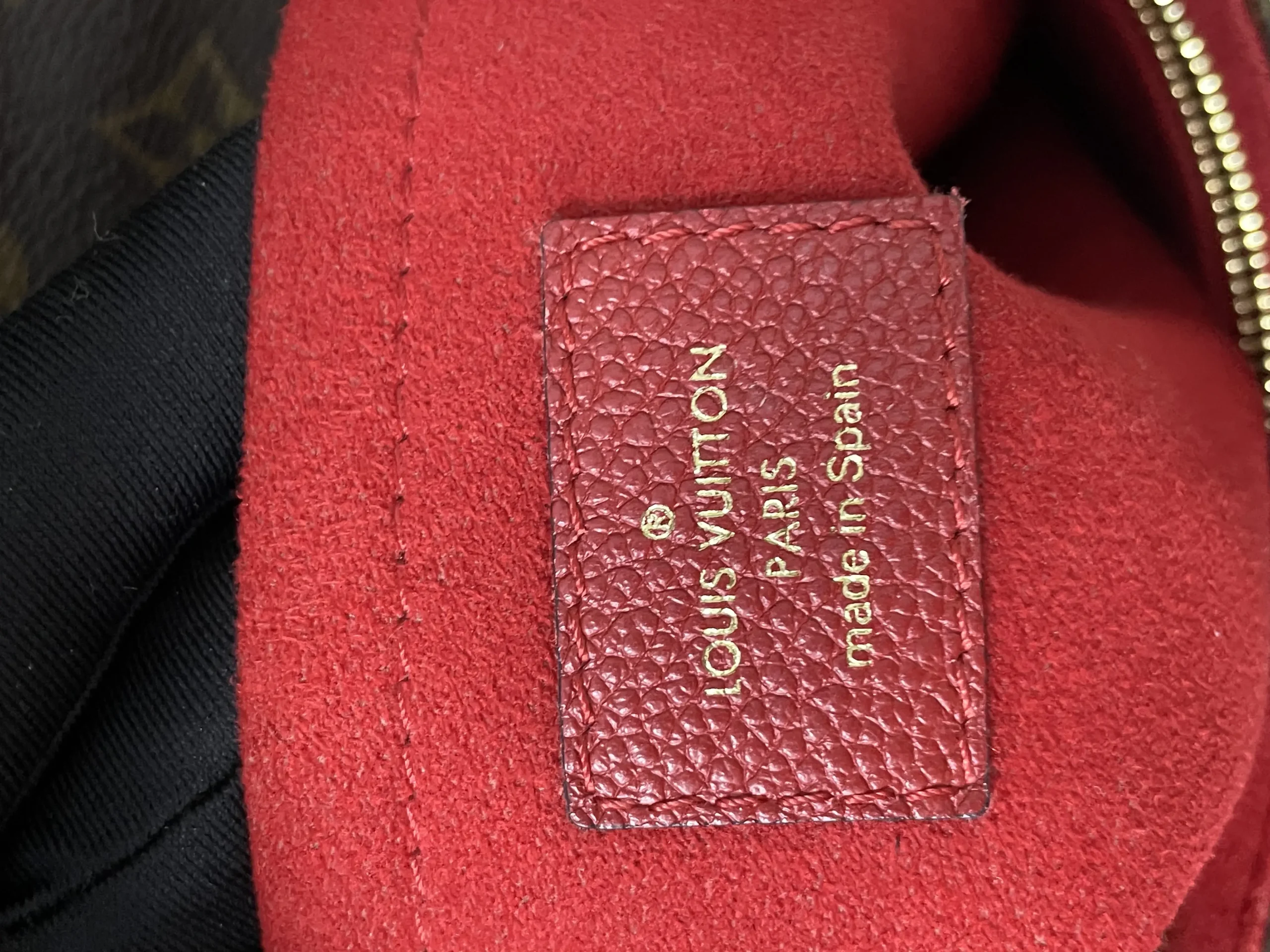 LOUIS VUITTON Saint Placide Envelope Bag in Red Monogram Empreinte Leather LOUIS VUITTON Saint Placide Envelope Bag in Red Monogram Empreinte Leather