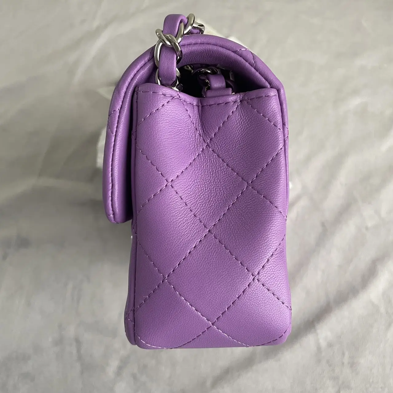 CHANEL Mini Classic Flap Bag in Purple Lambskin with Silver-Tone Hardware CHANEL Mini Classic Flap Bag in Purple Lambskin with Silver-Tone Hardware