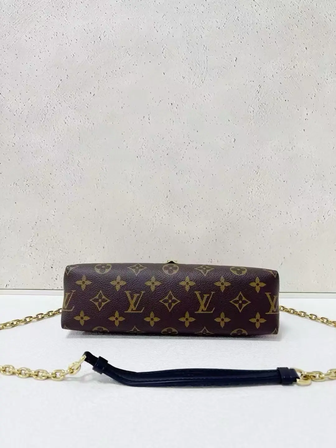 LOUIS VUITTON Saint Placide Envelope Bag in Red Monogram Empreinte Leather LOUIS VUITTON Saint Placide Envelope Bag in Red Monogram Empreinte Leather