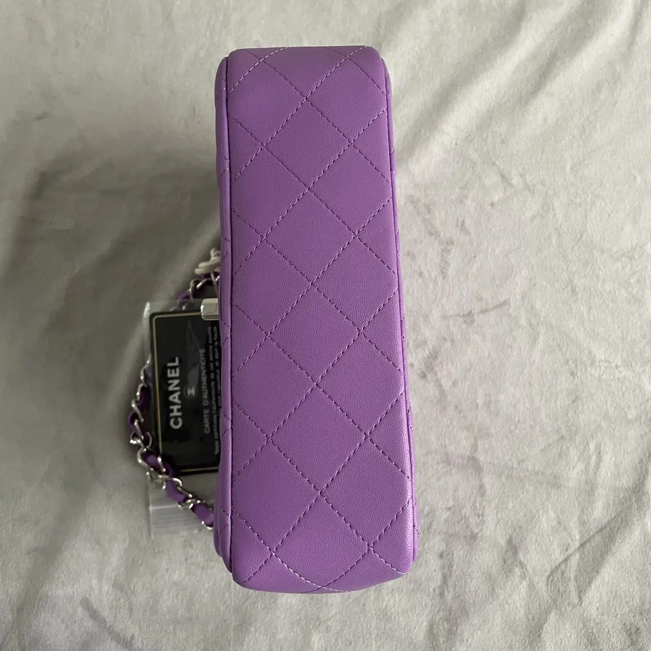 CHANEL Mini Classic Flap Bag in Purple Lambskin with Silver-Tone Hardware CHANEL Mini Classic Flap Bag in Purple Lambskin with Silver-Tone Hardware