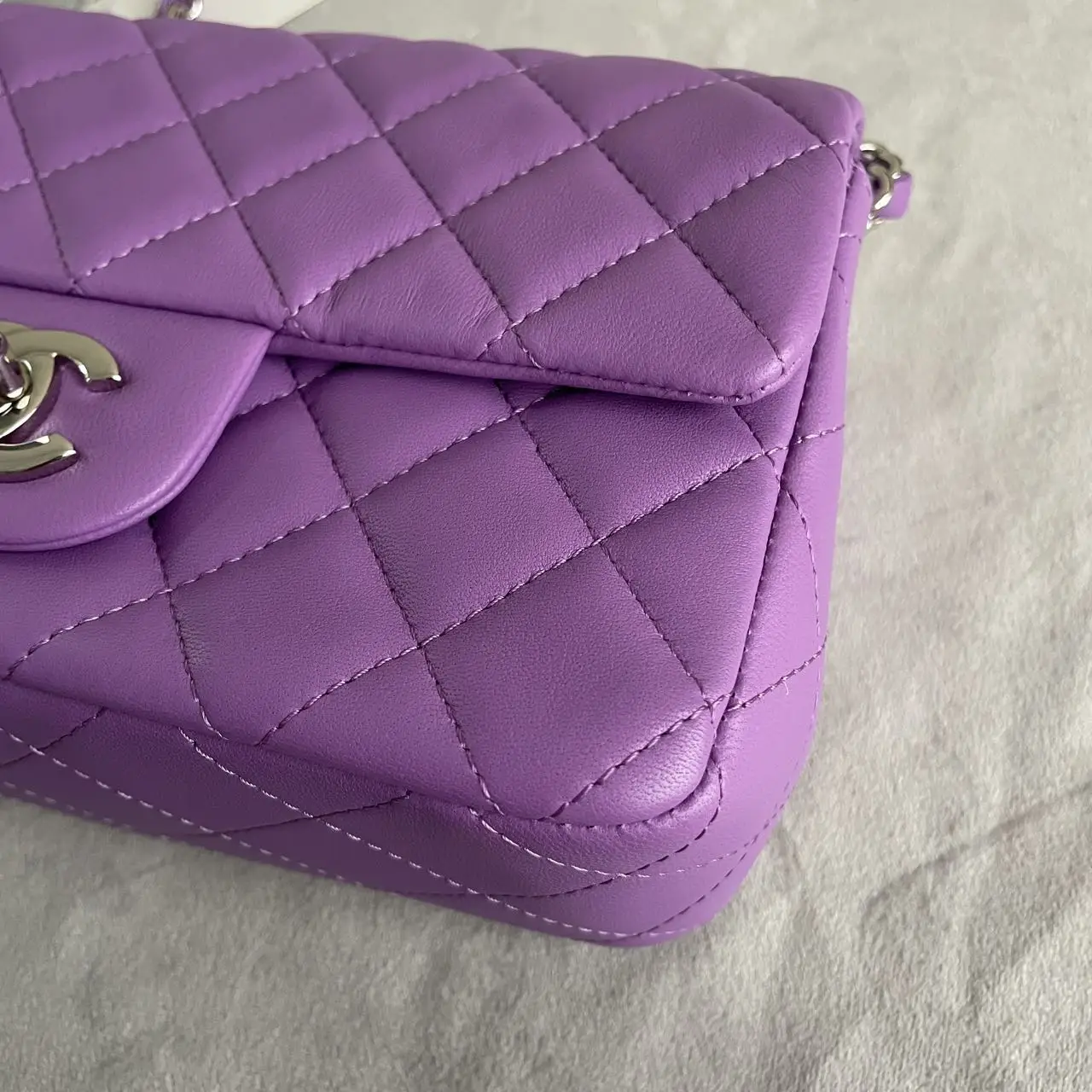 CHANEL Mini Classic Flap Bag in Purple Lambskin with Silver-Tone Hardware CHANEL Mini Classic Flap Bag in Purple Lambskin with Silver-Tone Hardware