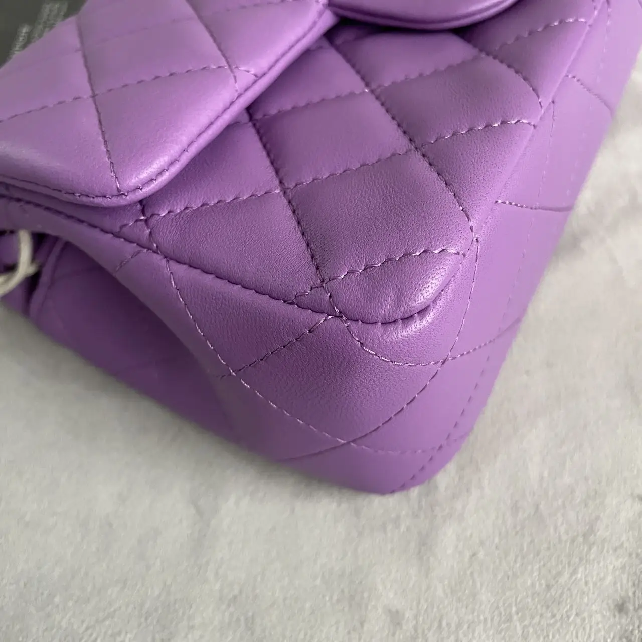 CHANEL Mini Classic Flap Bag in Purple Lambskin with Silver-Tone Hardware CHANEL Mini Classic Flap Bag in Purple Lambskin with Silver-Tone Hardware