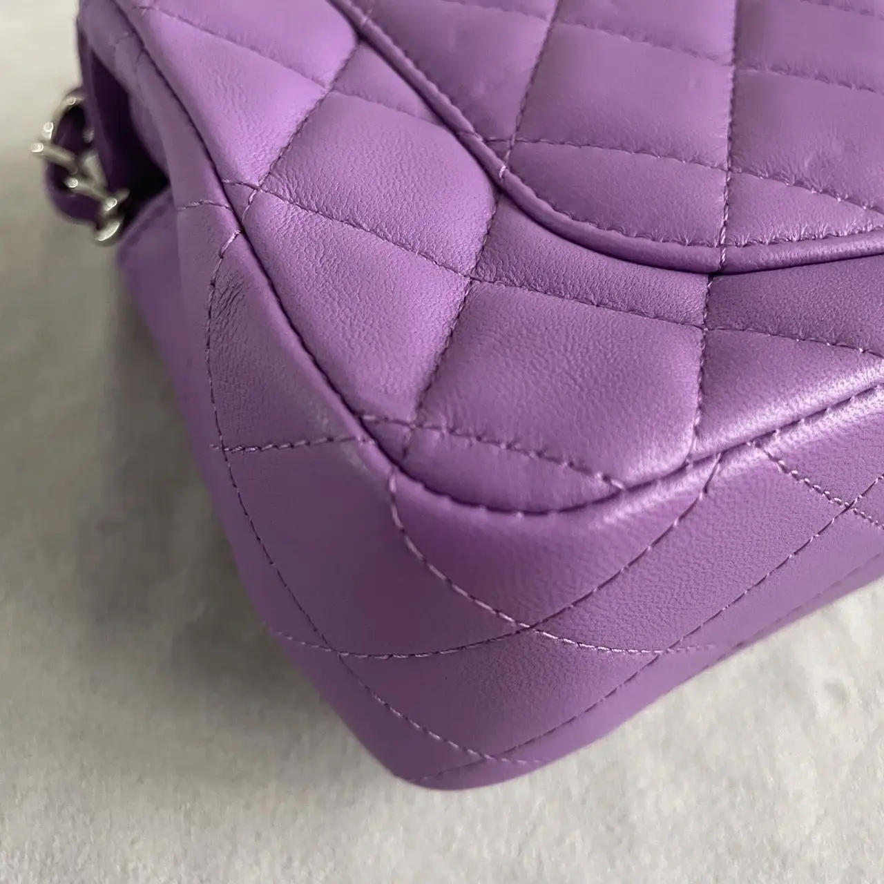 CHANEL Mini Classic Flap Bag in Purple Lambskin with Silver-Tone Hardware CHANEL Mini Classic Flap Bag in Purple Lambskin with Silver-Tone Hardware