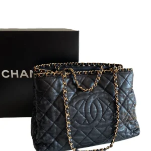 CHANEL Chain Me Tote Bag In Black Quilted Calfskin Leather With Gold-Tone Hardware.