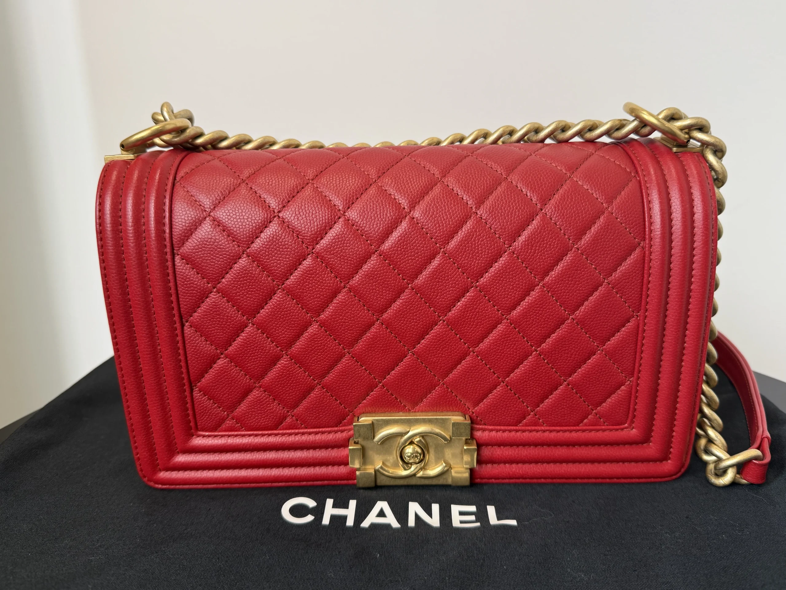 CHANEL Boy Bag Medium Red Caviar Leather Gold Hardware CHANEL Boy Bag Medium Red Caviar Leather Gold Hardware
